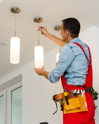 emergency electrician fixing lights